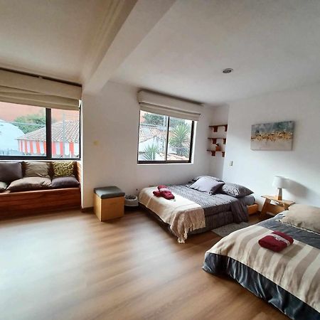 Hostal Mochiliers Bed And Breakfast Cuenca Exterior photo